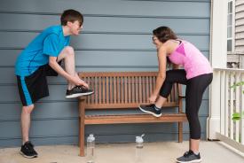 image tagged with tie, sneakers, couple, bench, patio, …;
