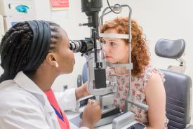 image tagged with doctor's office, women, eye exam, slit lamp, vision, …;