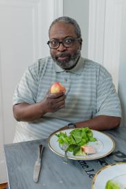 image tagged with food, leafy greens, man, plate, fork, …;