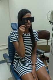 image tagged with doctor's appointment, exam room, doctor, eye exam, african-american, …;