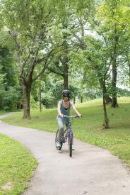 image tagged with biking, outside, lady, park, woman, …;