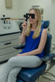 image tagged with exam, doctor, eye exam, caucasian, girl, …;