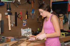 image tagged with safety, workshop, female, hammers, goggles, …;